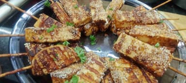 Delicious Thai Paneer Satay prepared by COOX