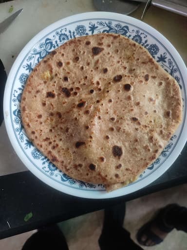 Delicious Stuffed Paranthas prepared by COOX