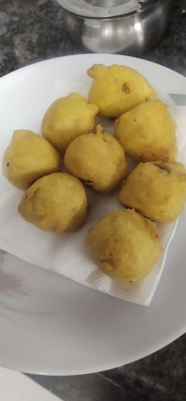 Tasty Aloo Bonda cooked by COOX chefs cooks during occasions parties events at home