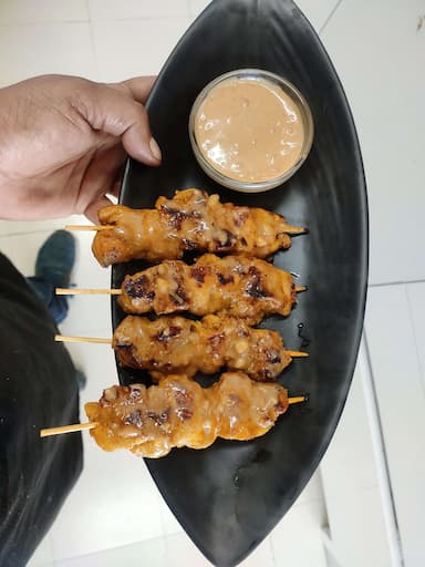 Tasty Thai Chicken Satay cooked by COOX chefs cooks during occasions parties events at home