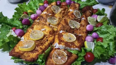 Tasty Baked Fish  cooked by COOX chefs cooks during occasions parties events at home
