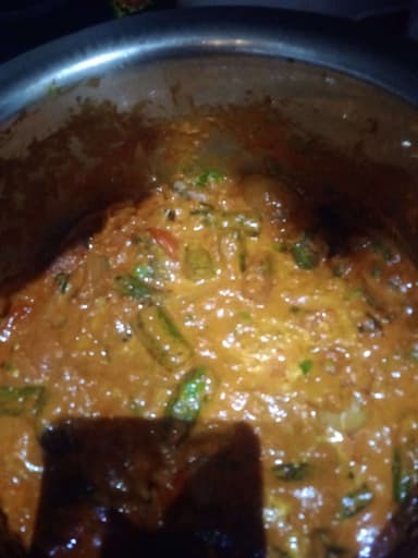 Tasty Bhindi do Pyaza cooked by COOX chefs cooks during occasions parties events at home