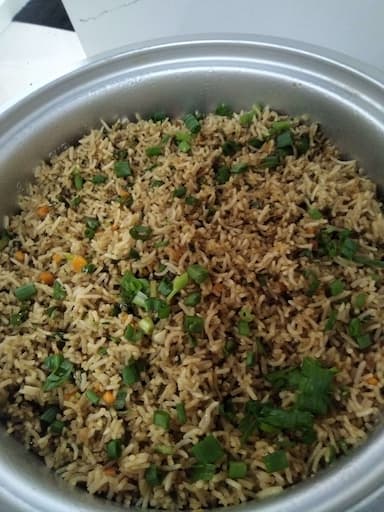 Tasty Burnt Garlic Rice cooked by COOX chefs cooks during occasions parties events at home