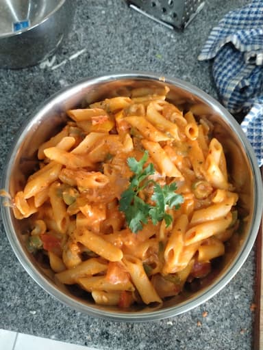 Tasty Pasta in Red Sauce cooked by COOX chefs cooks during occasions parties events at home