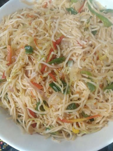 Tasty Chilli Garlic Noodles cooked by COOX chefs cooks during occasions parties events at home
