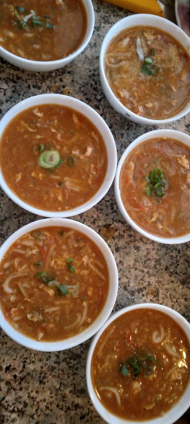 Tasty Chicken Manchow Soup cooked by COOX chefs cooks during occasions parties events at home