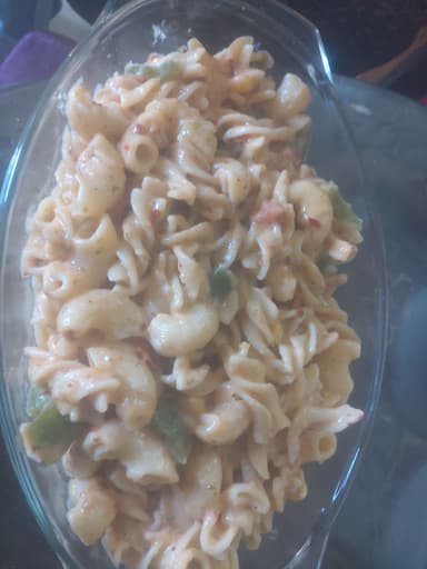 Tasty Chicken Pasta in White Sauce cooked by COOX chefs cooks during occasions parties events at home