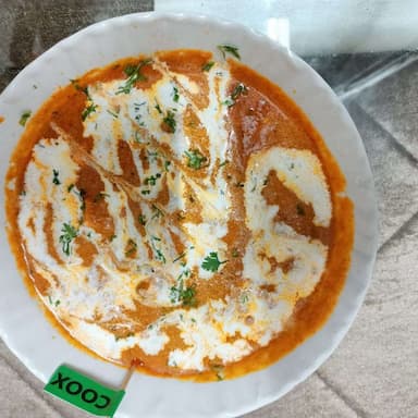Tasty Paneer Makhani cooked by COOX chefs cooks during occasions parties events at home