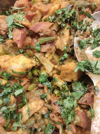 Tasty Aloo Patta Gobhi cooked by COOX chefs cooks during occasions parties events at home