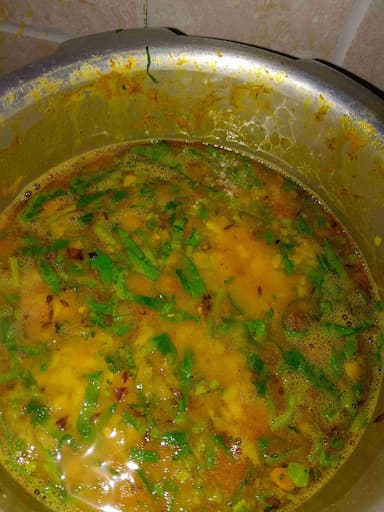 Tasty Palak Dal cooked by COOX chefs cooks during occasions parties events at home