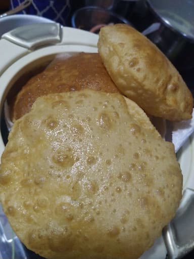 Tasty Pooris & Bedmis cooked by COOX chefs cooks during occasions parties events at home