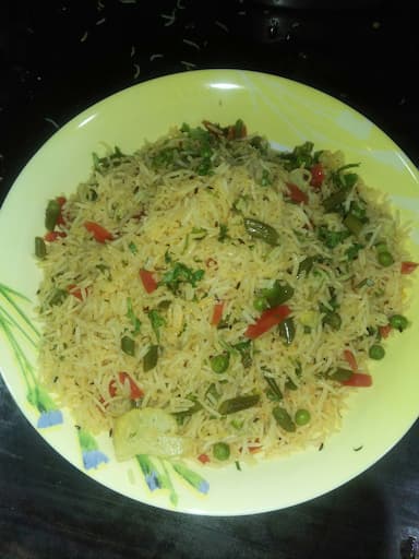 Tasty Veg Pulao cooked by COOX chefs cooks during occasions parties events at home