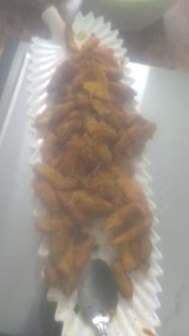 Delicious Crispy Chilly Baby Corn prepared by COOX