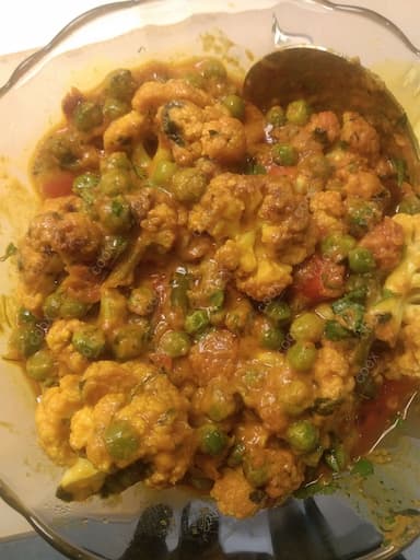 Delicious Gobhi Matar prepared by COOX