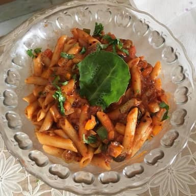 Delicious Veg Pasta in Red Sauce prepared by COOX