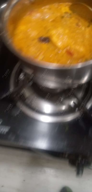 Delicious Paneer Butter Masala prepared by COOX