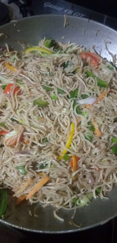 Delicious Veg Hakka Noodles prepared by COOX