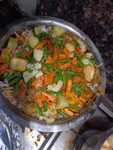 Delicious Veg Biryani prepared by COOX
