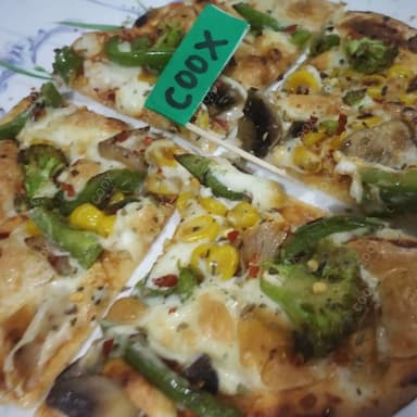 Delicious Classic Veggie Pizza prepared by COOX