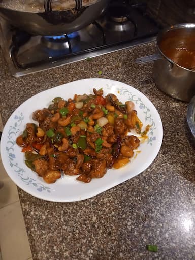 Delicious Kung Pao Chicken prepared by COOX