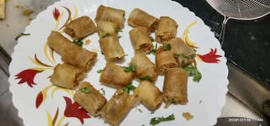Delicious Veg Spring Rolls prepared by COOX