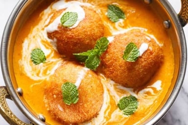 Delicious Malai Kofta (Orange Gravy) prepared by COOX