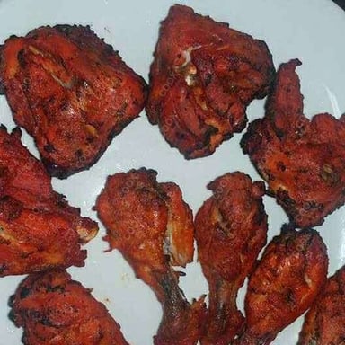 Tasty Tandoori Chicken cooked by COOX chefs cooks during occasions parties events at home