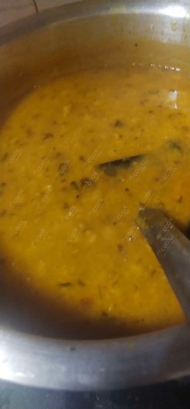 Delicious Dal Tadka prepared by COOX