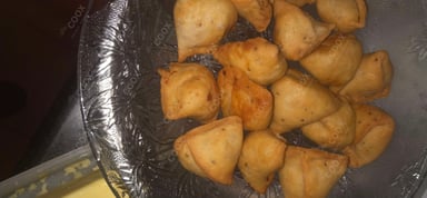 Delicious Mini Samosas prepared by COOX