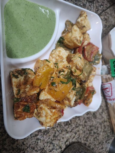 Delicious Paneer Tikka prepared by COOX