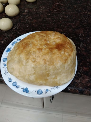 Delicious Bhature prepared by COOX