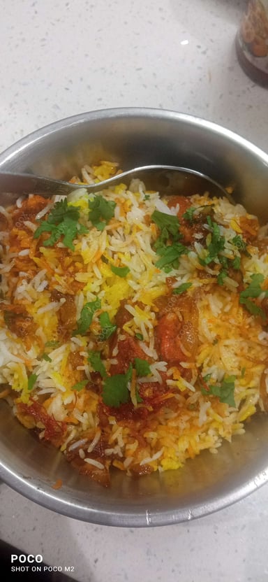 Delicious Chicken Biryani prepared by COOX