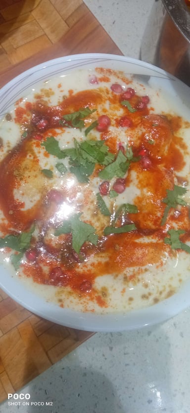 Delicious Dahi Bhalla prepared by COOX