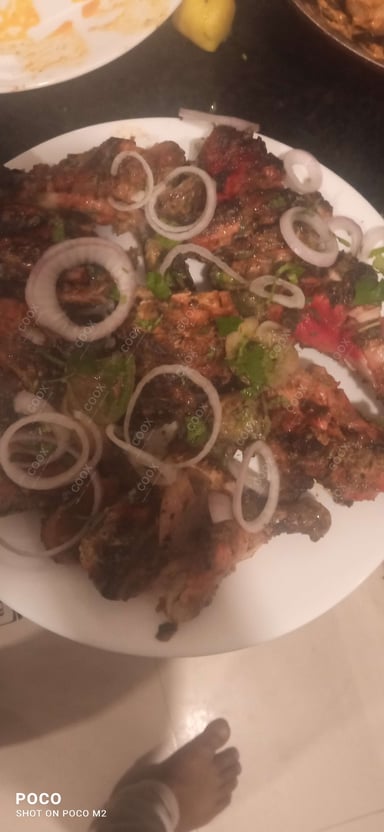 Tasty Tandoori Chicken cooked by COOX chefs cooks during occasions parties events at home