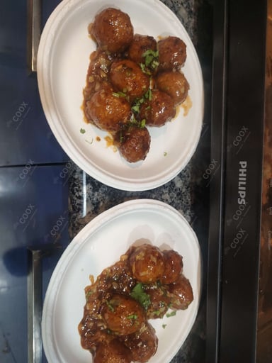 Delicious Veg Manchurian (Dry) prepared by COOX