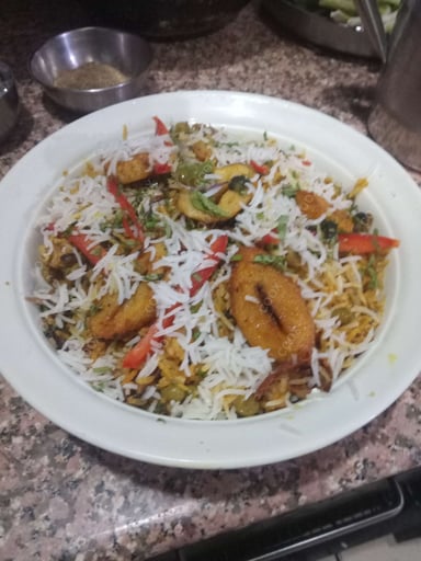 Delicious Veg Biryani prepared by COOX