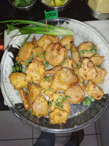 Tasty Mix Pakode cooked by COOX chefs cooks during occasions parties events at home