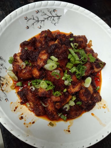 Delicious Chicken in Schezwan Sauce prepared by COOX