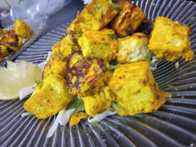 Delicious Paneer Tikka prepared by COOX