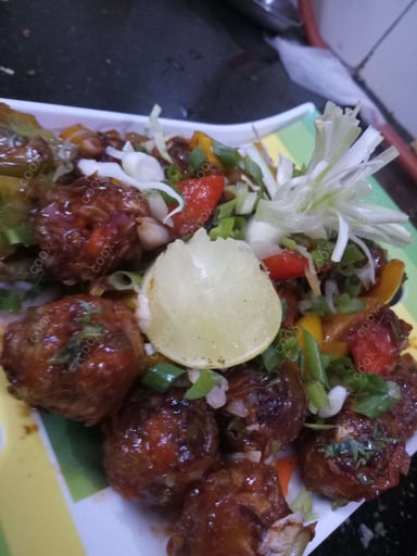 Delicious Veg Manchurian (Dry) prepared by COOX