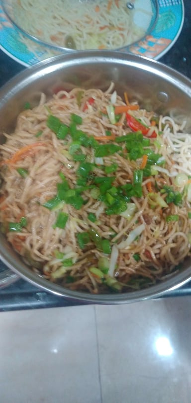 Delicious Veg Hakka Noodles prepared by COOX