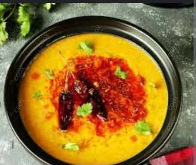 Delicious Dal Tadka prepared by COOX