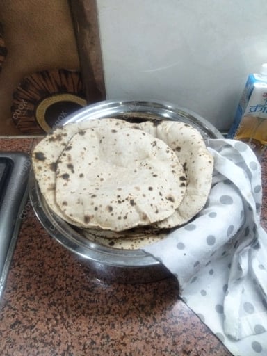 Delicious Tawa Rotis prepared by COOX