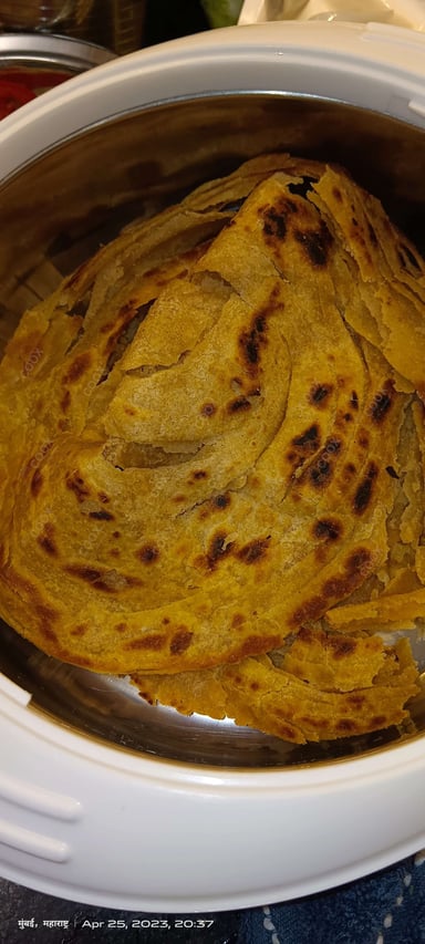 Delicious Lachha Parathas prepared by COOX