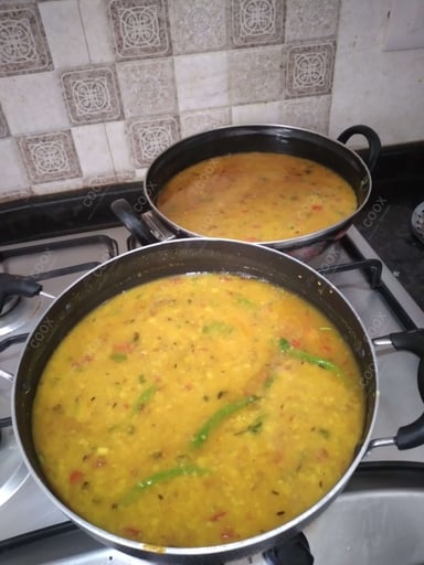 Delicious Dal Tadka prepared by COOX