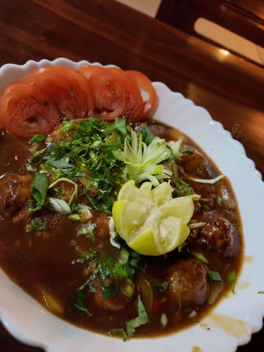 Delicious Veg Manchurian (Gravy) prepared by COOX