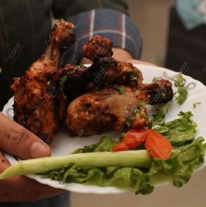 Tasty Chilli  Chicken cooked by COOX chefs cooks during occasions parties events at home