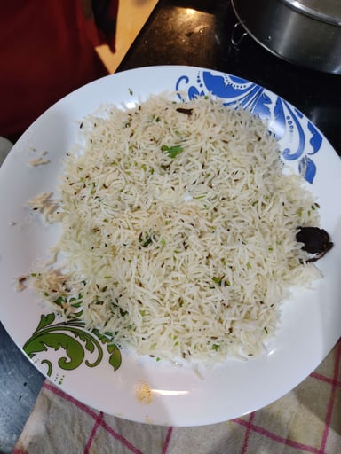 Delicious Jeera Rice prepared by COOX