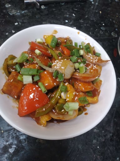 Delicious Chilli Paneer (Dry) prepared by COOX