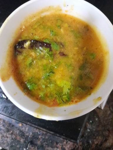 Delicious Dal Tadka prepared by COOX